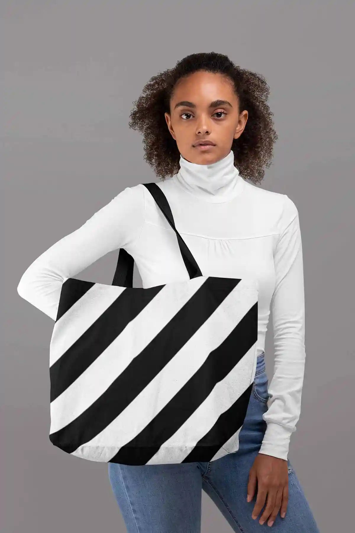 Diagonal Stripes digital art print on a tote bag featuring a serious-looking woman at a studio.