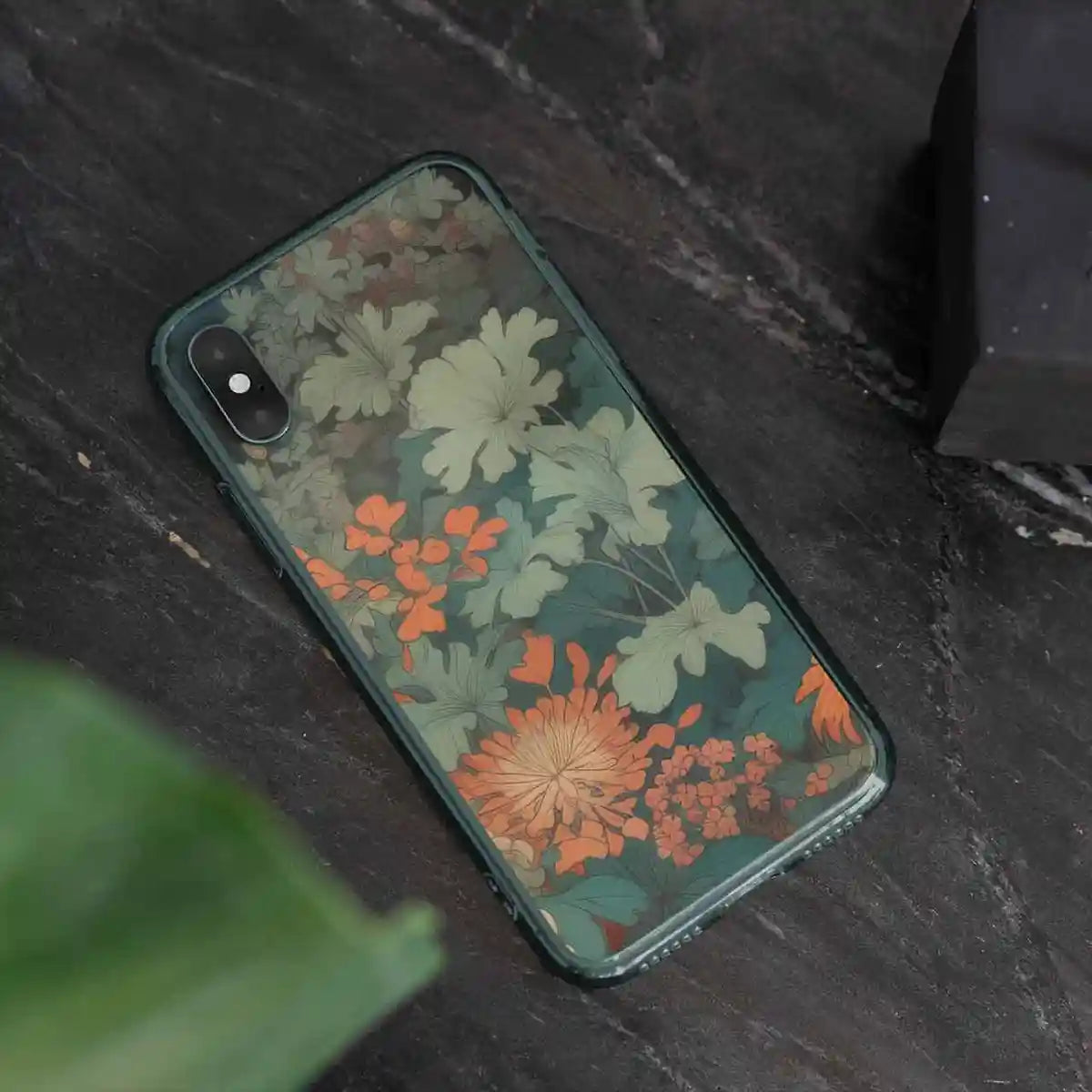 Midnight Garden digital art print on a clear phone case, placed on a table with a tranquil and vibrant garden scene.