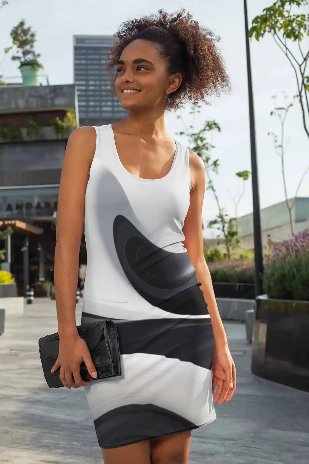 BW Ebb digital art print featuring a woman wearing a racerback dress in the city.
