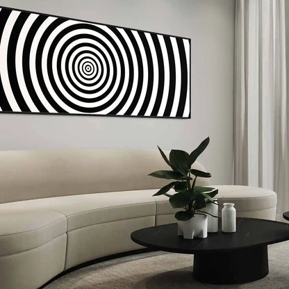 Circles digital art print on oversized wall art in a modern living room with a minimalistic sofa, side view.