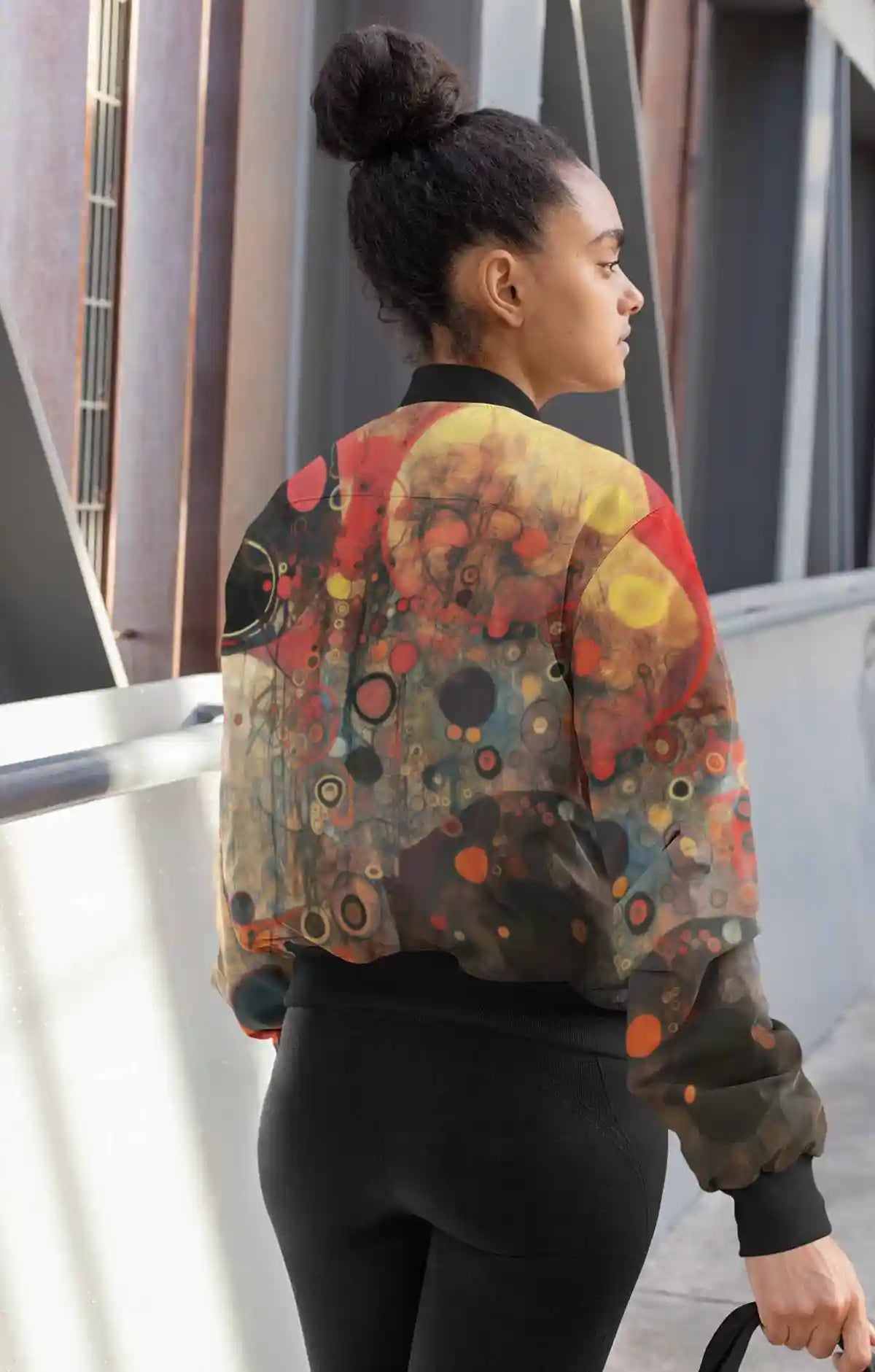 Conflated Serenade digital art print on a bomber jacket featuring a woman standing back to the camera.