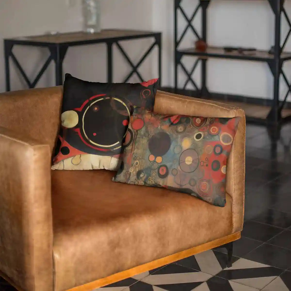 Two throw pillows with Conflated Serenade digital art print on leather couch.