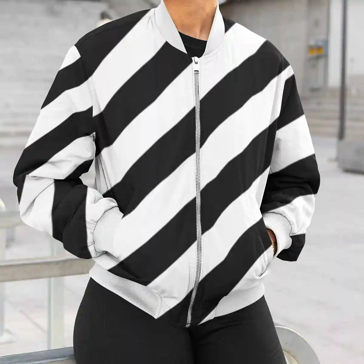 Bomber jacket featuring Diagonal Stripes digital art print worn by young woman.