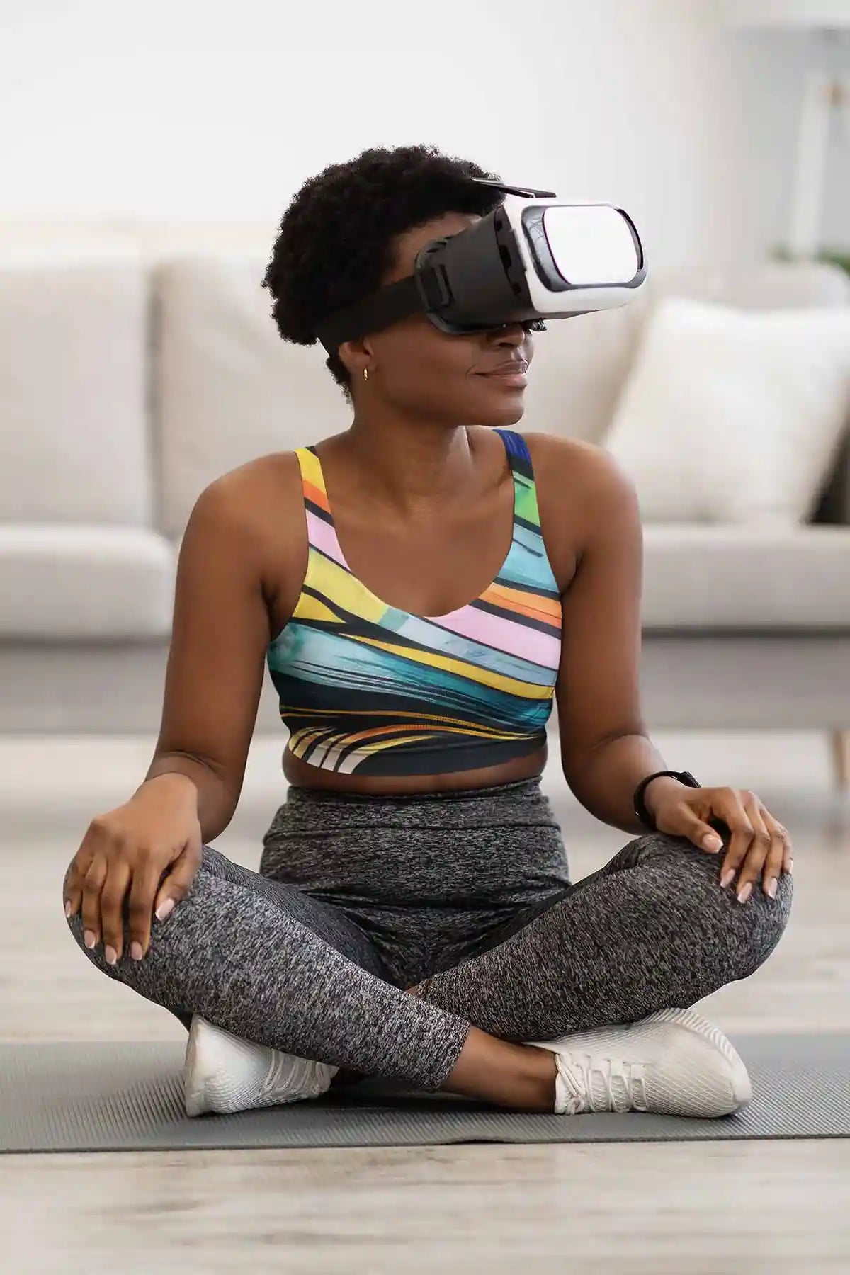 Gritshade digital art print on a sports bra featuring a woman wearing a VR headset.