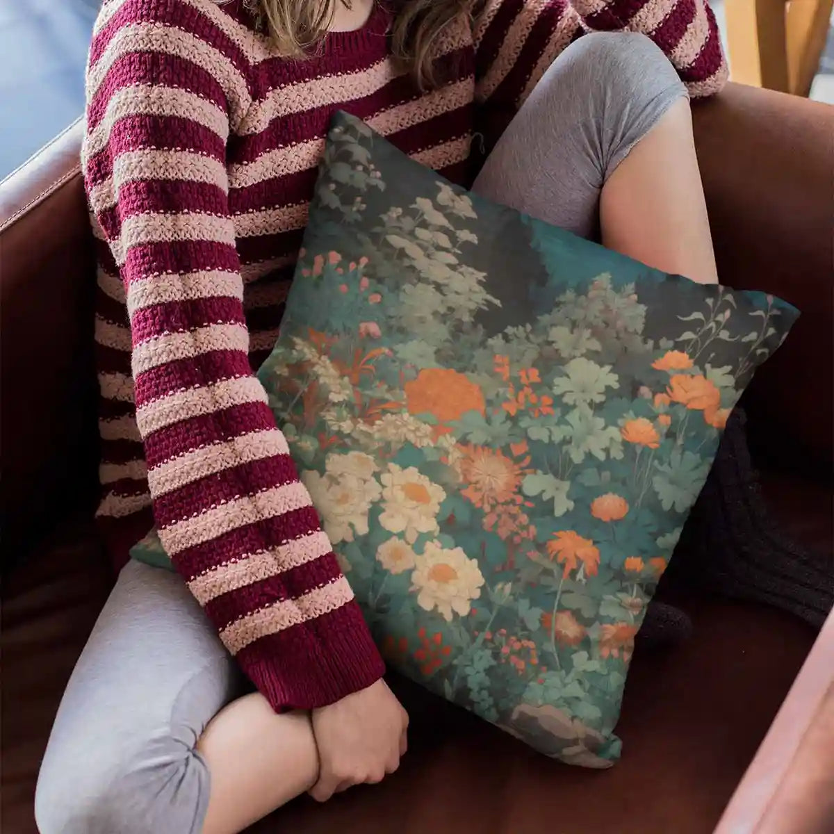 Girl sitting on sofa with pillow featuring Midnight Garden digital art print.