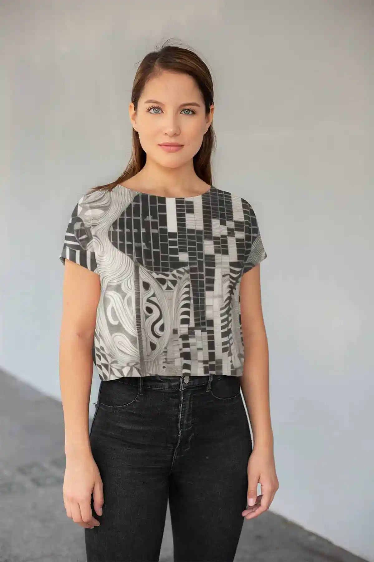 Monoka-5 digital art print on a crop top, featuring a woman looking at the camera, showcasing a bold geometric design.