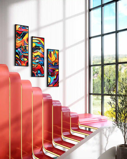 Multivue digital art print on oversized triptych wall art displayed by a red modern staircase, viewed from the side, adding vibrant energy and contemporary art to the space.