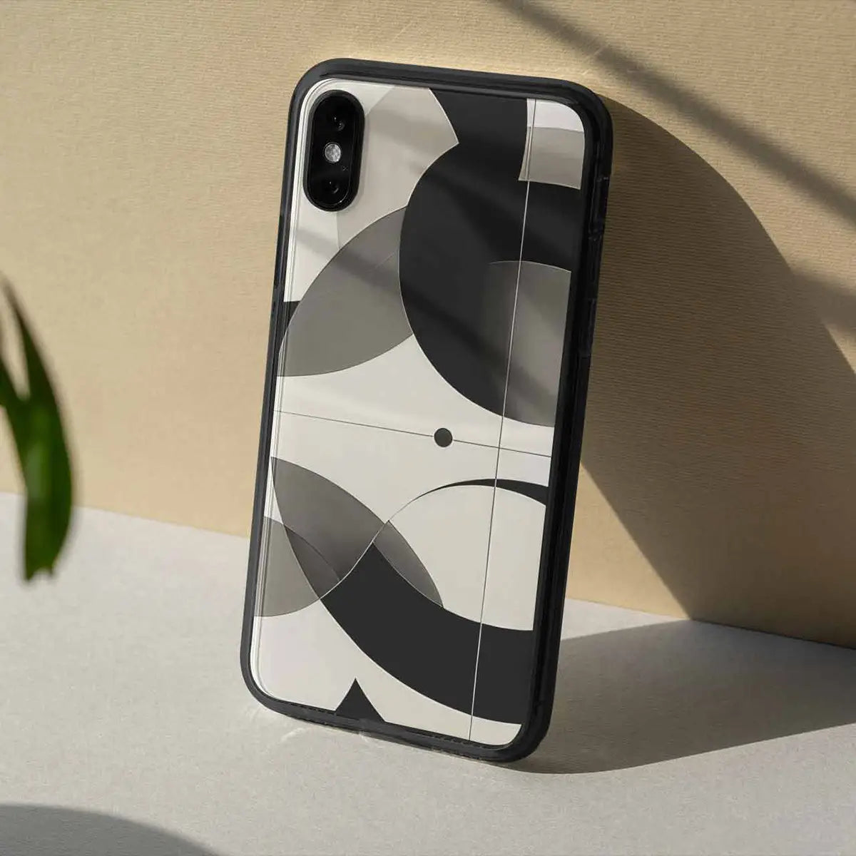 Overlapping Circles digital art print on a clear phone case, placed against a wall, perfect for modern wall art and contemporary art.