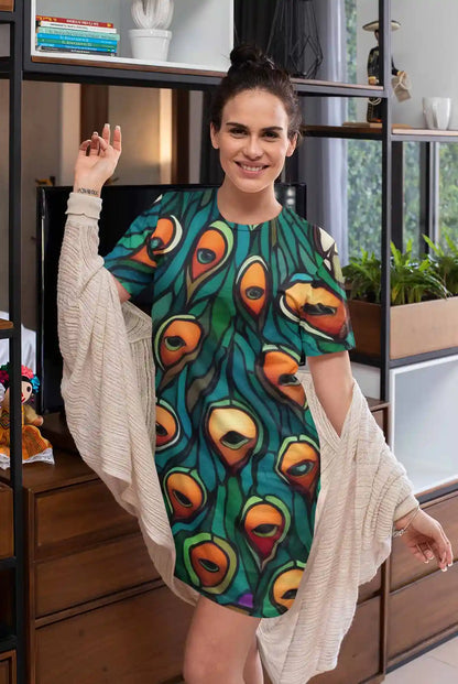 Peacock 1 digital art print on a night dress, featuring a happy woman at home, showcasing vibrant stained glass peacock contemporary art